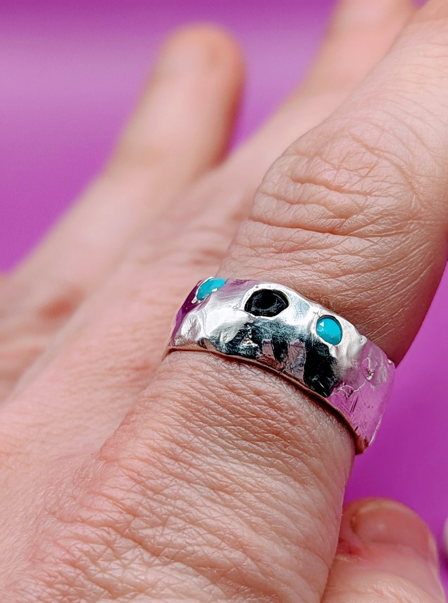 Recycled silver ring with organic texture and bold gemstone contrast – sandcast from wax