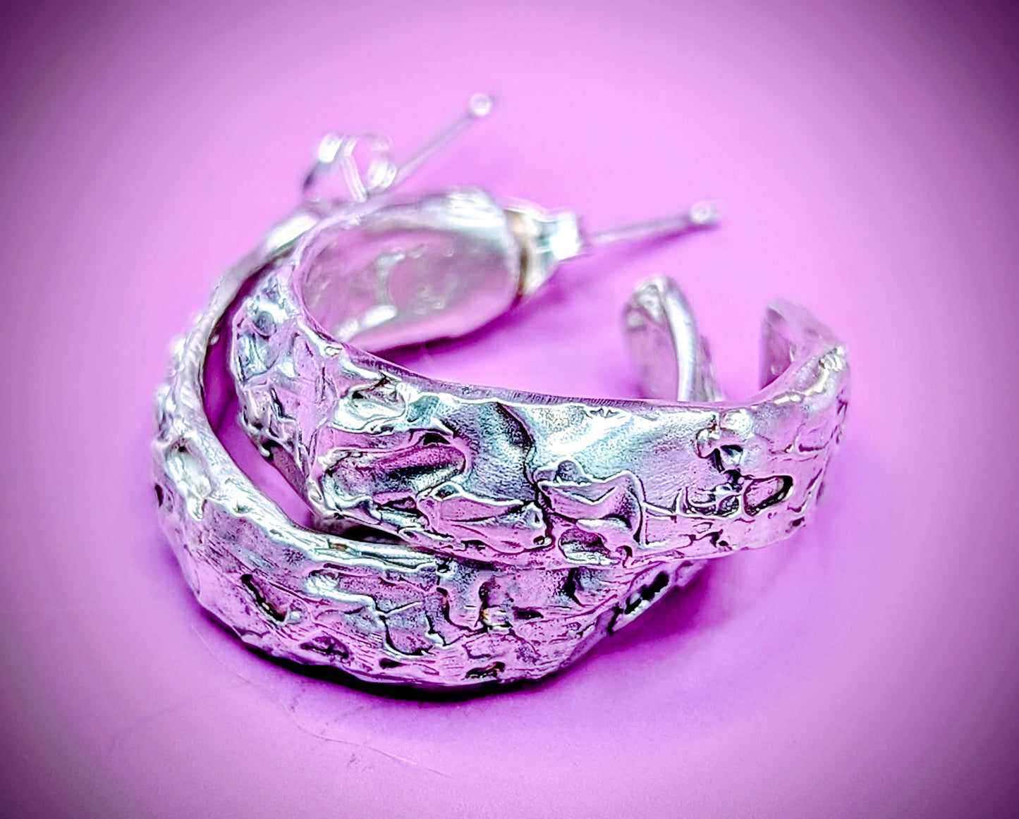 Pair of lost wax silver hoop earrings – artisanal design with dark patina