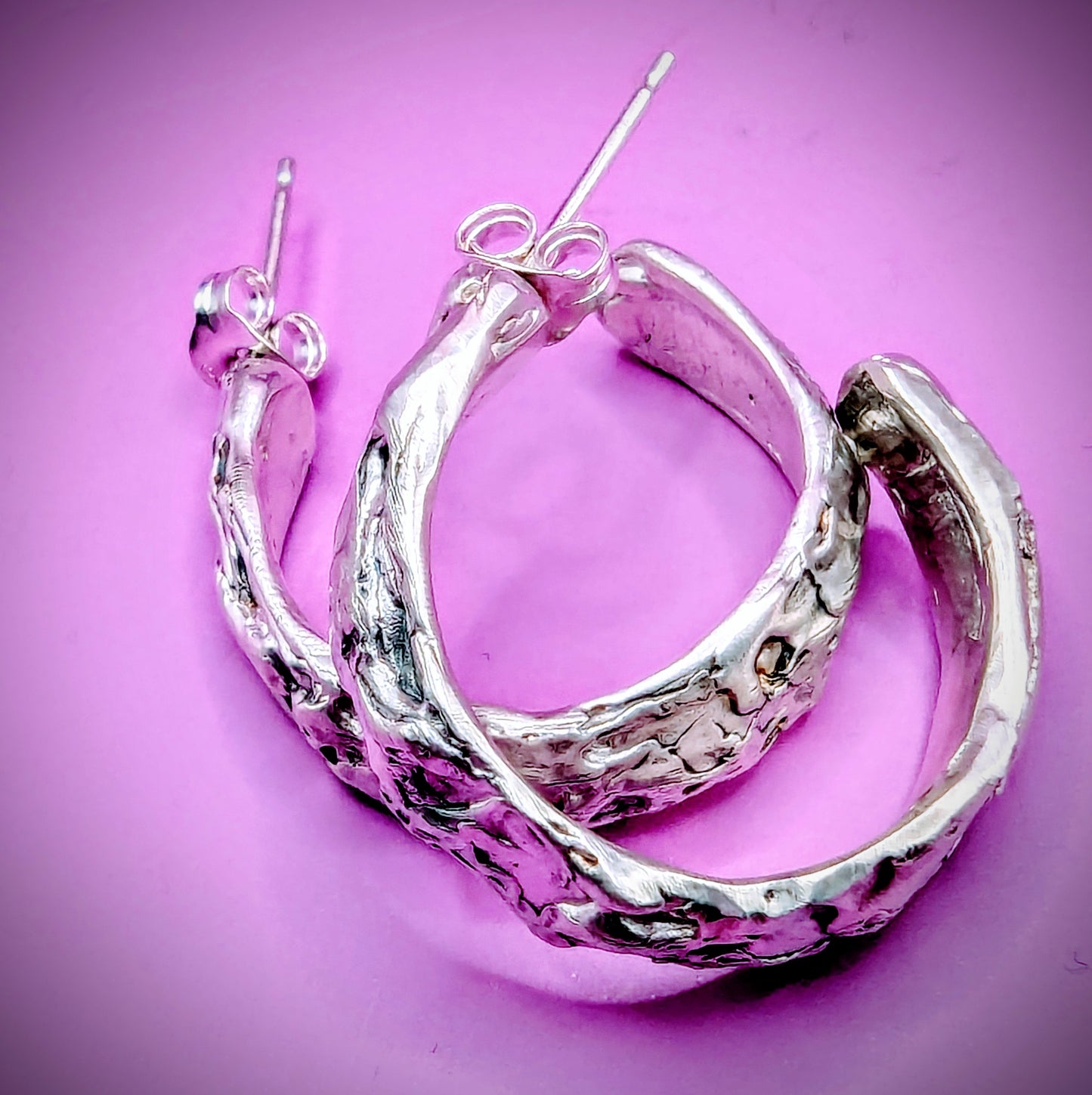 Hand-sculpted silver hoops with bumps and grooves – gothic recycled silver earrings