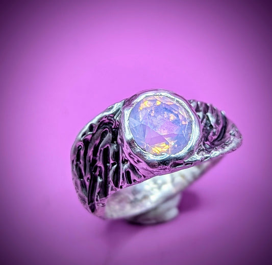 Handmade lost wax silver ring with pink opal nano gem – feathered wing-inspired design