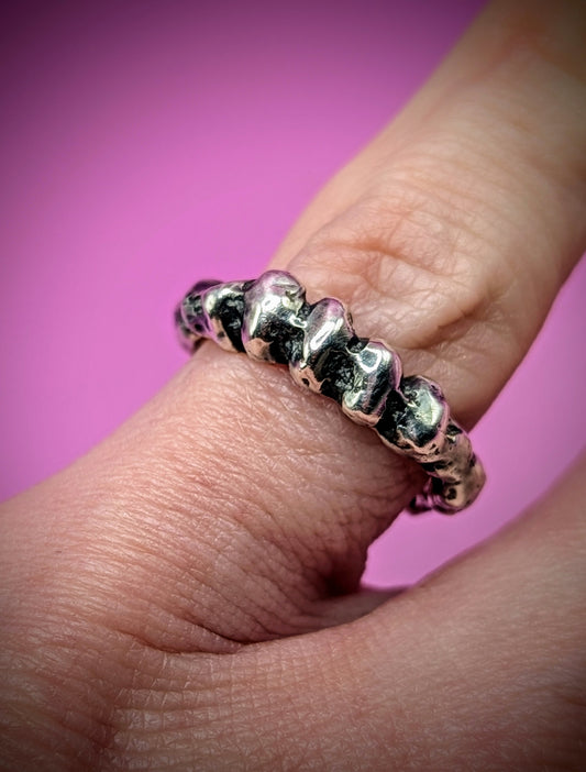 Handmade recycled silver ring with raw organic texture – sandcast bone-inspired jewellery