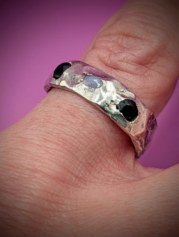 Organic handmade silver ring with black onyx and dreamy opal – UK sand cast recycled jewellery