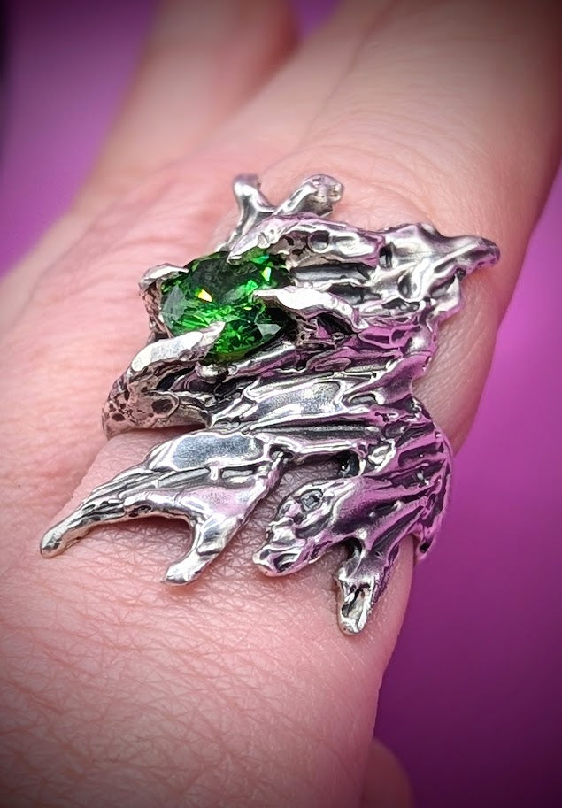 Hand-carved silver ring with twisted band and green stone – lost wax casting technique