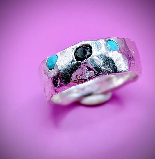 Handmade sandcast silver ring with turquoise and onyx nano gems – raw textured design