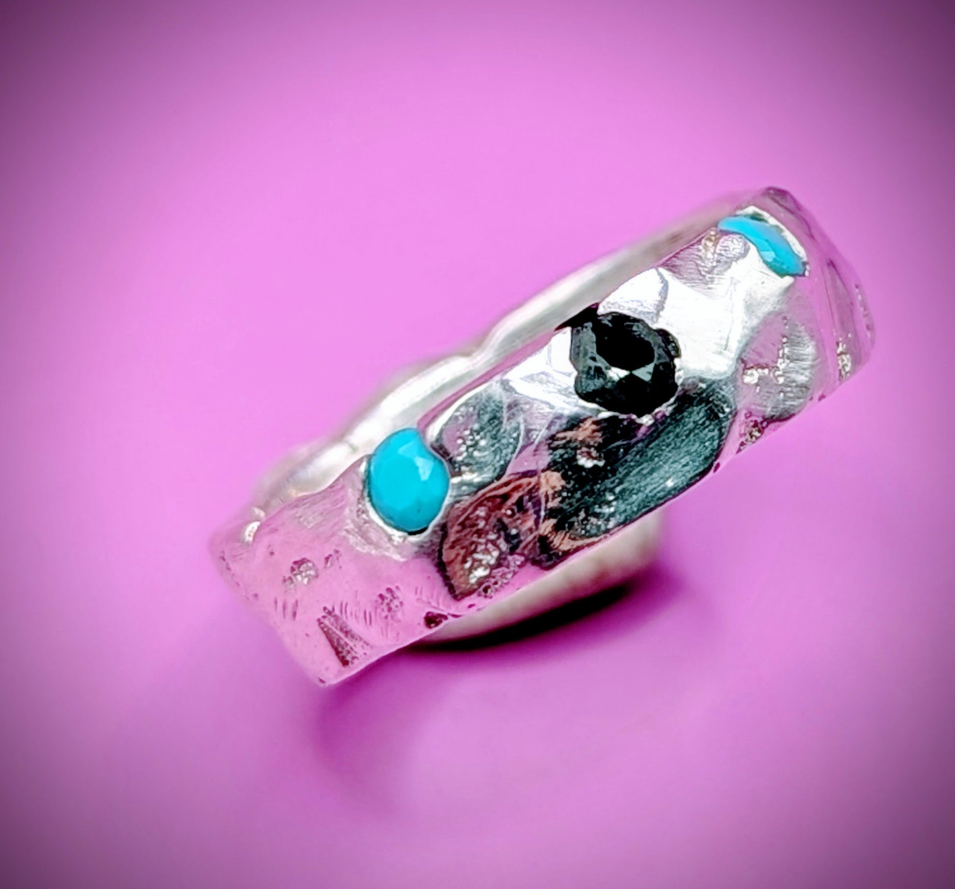Hand-carved silver ring with onyx and turquoise gems – ethical handmade jewellery UK