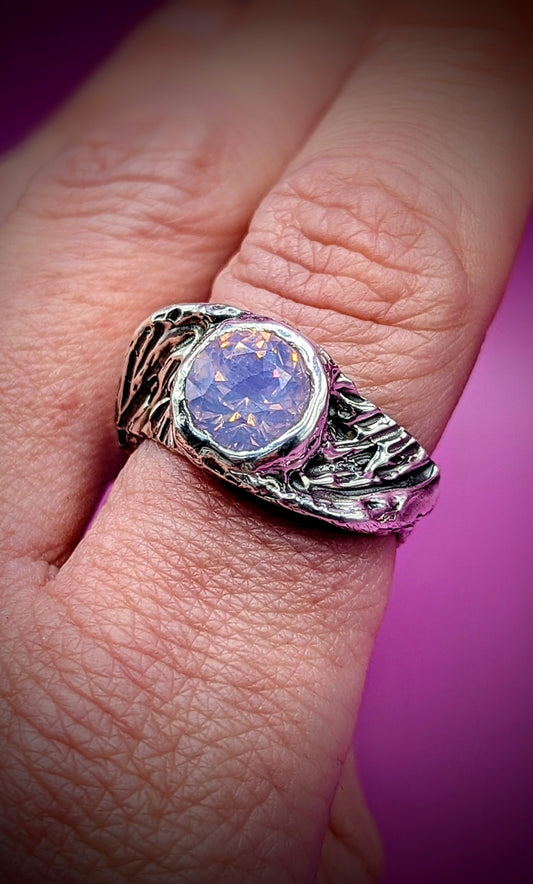 Sculpted silver ring with textured band and iridescent gem – handmade expressive jewellery