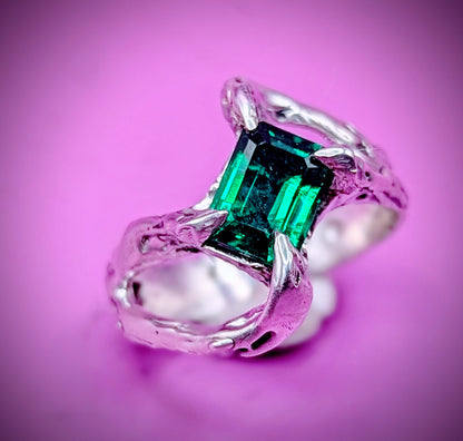 Handmade lost wax silver ring with emerald green nano gem – twisted branch design