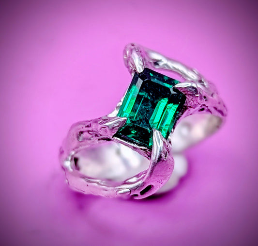 Handmade lost wax silver ring with emerald green nano gem – twisted branch design