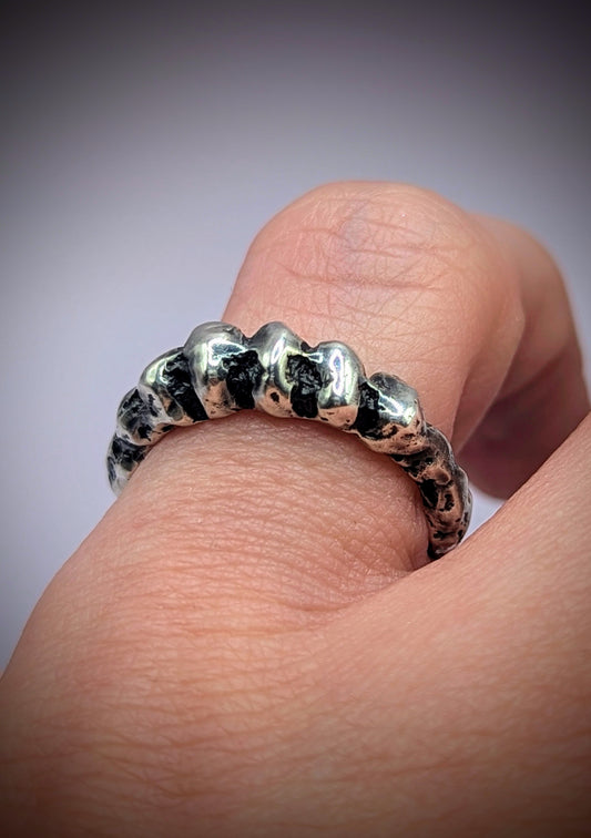 Sandcast silver ring resembling knuckle bone – handmade rustic jewellery UK