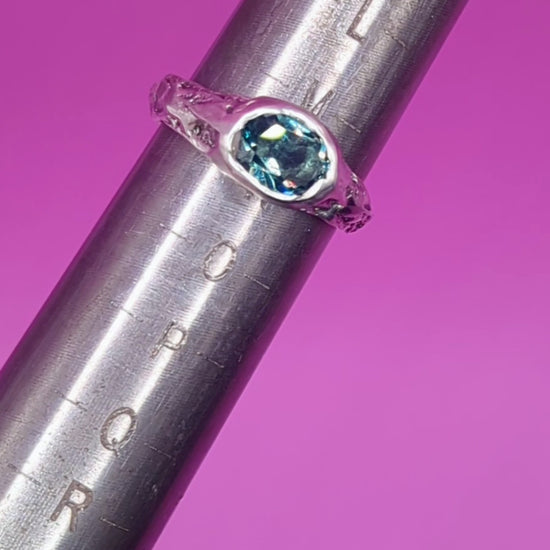 Mandrel view of handmade silver ring with Alexandrite – sandcast textured band close-up