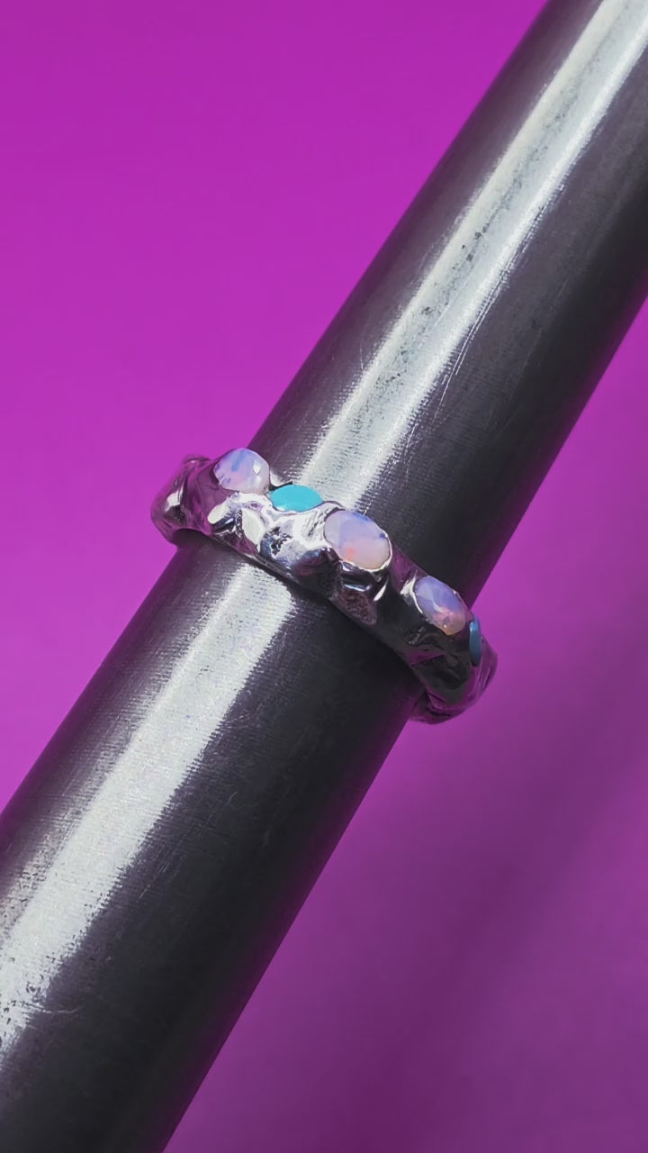 Video of sandcast ring with nano opals raw bold texture recycled sliver and eco friendly gems 